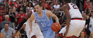 Ian Lituchy/The USD Vista Duda Sanadze, USD senior, dribbles through SDSU players to lead the team to a win last weekend.