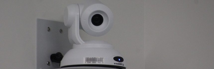 White wall-mounted camera
