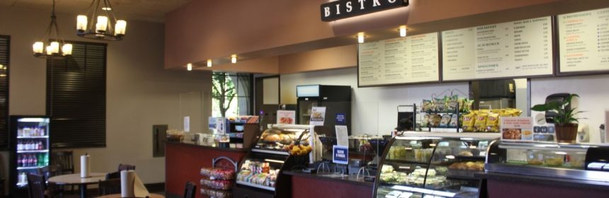 Interior of Bert's Bistro showing a long counter to order food and tables