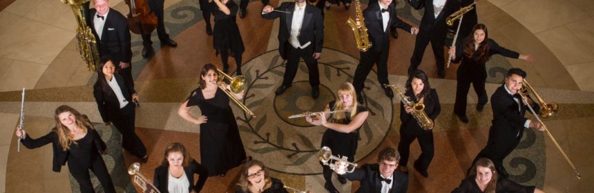 Birds eye view image of group of students playing band instruments