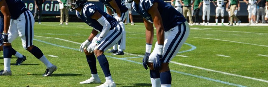 Football players lined up during a game