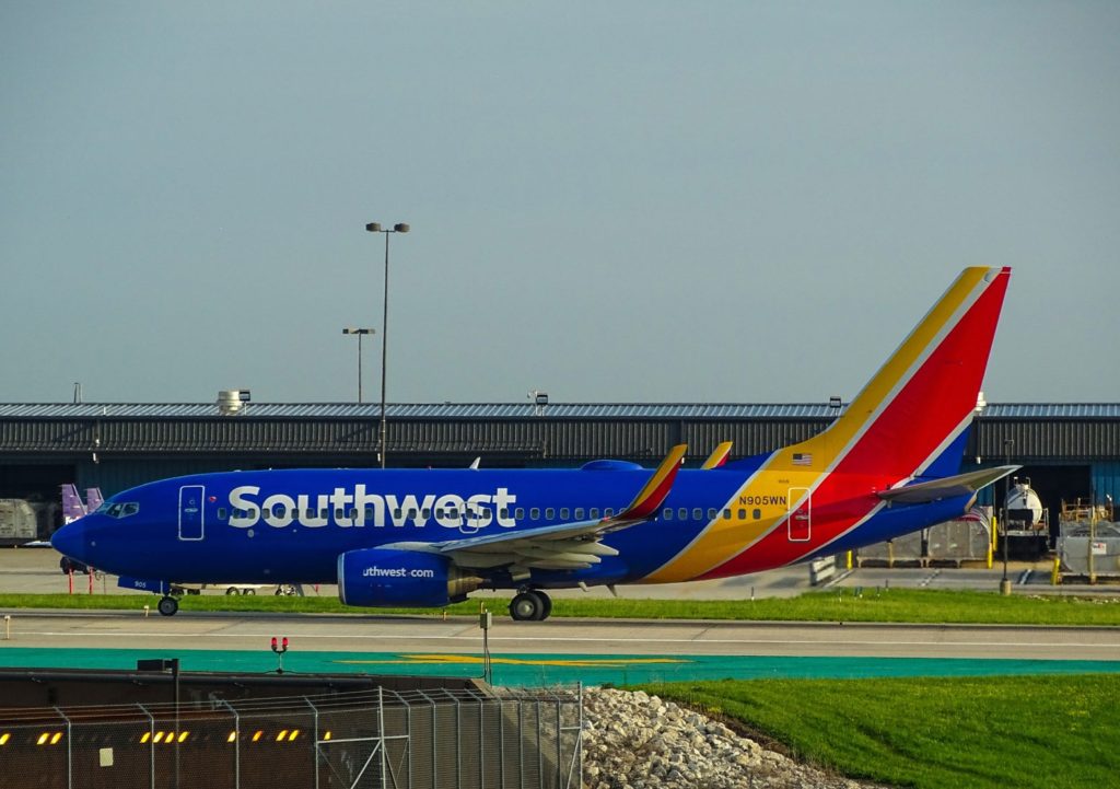 Southwest Airlines plane parked at airport gate