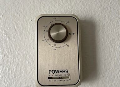 Heater dial on wall