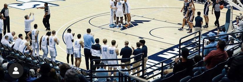 Screenshot of Instagram post showing USD basketball game