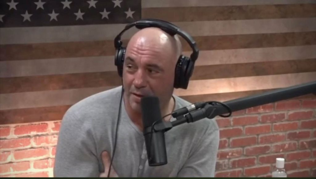 Joe Rogan, the podcast host, speaking into a microphone