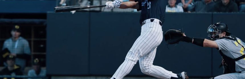 Baseball player hitting the ball