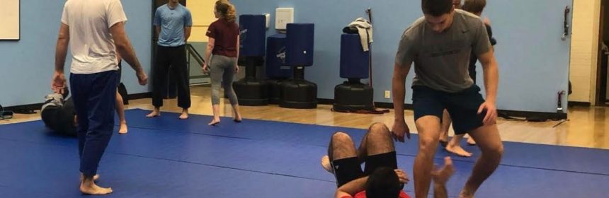 People working out on gym mats