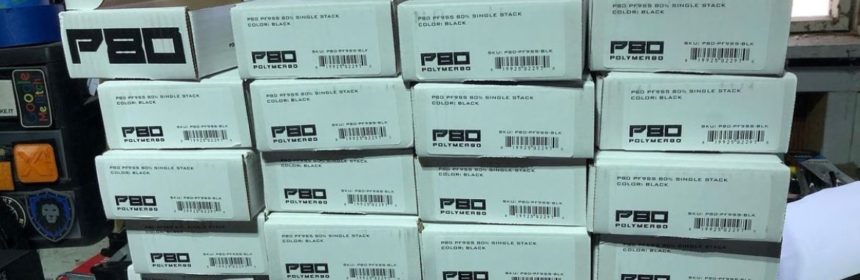 Stacked up small white boxes