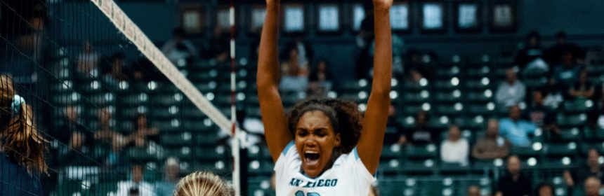 Woman volleyball player celebrating