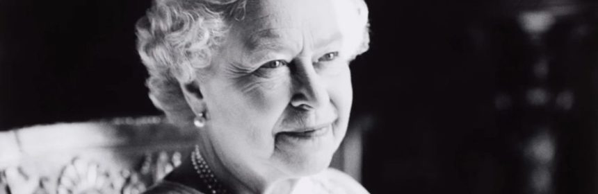 black and white photo of old lady smiling