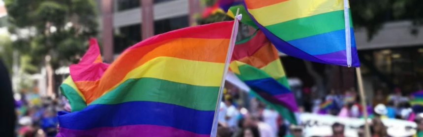 two rainbow pride flags